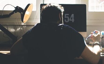 A man on a computer